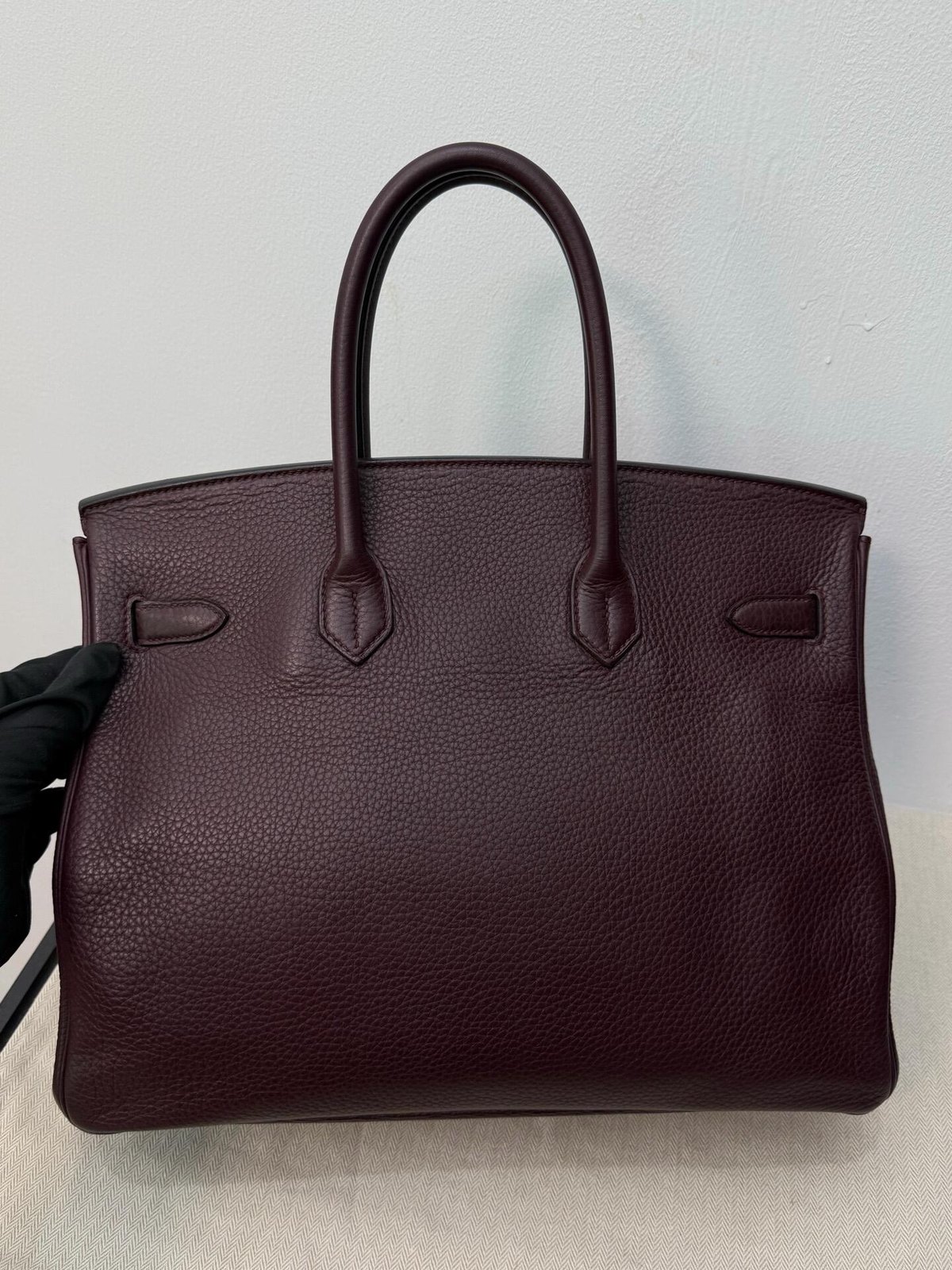Deep brown double-handle leather bag
